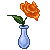orange Rose in teardrop crystal vase dewless